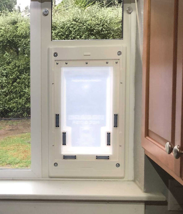 White Dragon Double Flap Pet Door for Windows from the top, showing the two flaps closed.